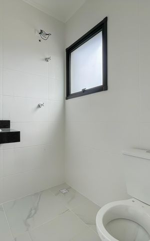Casa de condomínio à venda com 67m², 2 quartos e 2 vagas Casa de condomínio à venda com 67m², 2 quartos e 2 vagasBanheiro da Suíte 2
