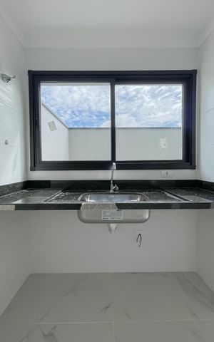 Casa de condomínio à venda com 67m², 2 quartos e 2 vagas Casa de condomínio à venda com 67m², 2 quartos e 2 vagasCozinha
