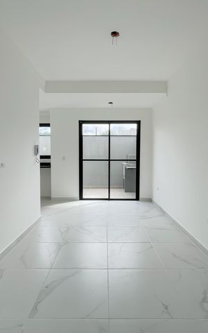 Casa de condomínio à venda com 67m², 2 quartos e 2 vagas Casa de condomínio à venda com 67m², 2 quartos e 2 vagasSala