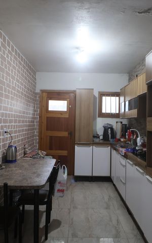 Casa para alugar com 50m², 2 quartos e 2 vagasCozinha