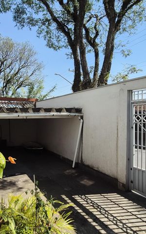 Casa à venda com 277m², 4 quartos e 2 vagas Casa à venda com 277m², 4 quartos e 2 vagasGaragem