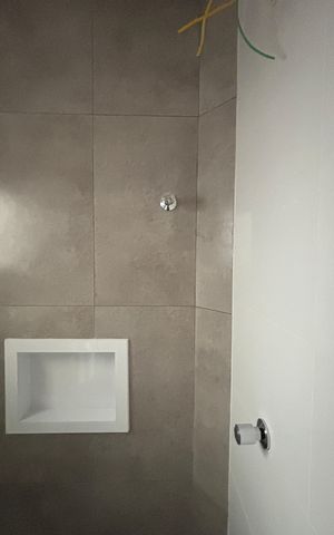 Apartamento à venda com 105m², 2 quartos e 1 vaga Apartamento à venda com 105m², 2 quartos e 1 vagaBanheiro Social