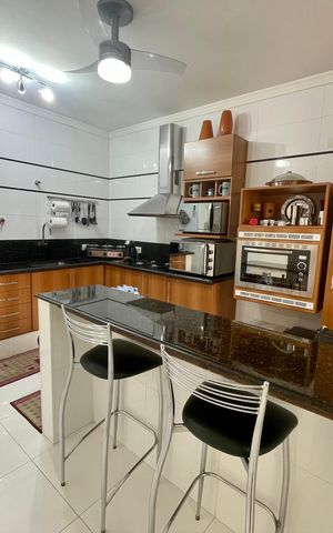 Casa à venda com 148m², 2 quartos e 2 vagas Casa à venda com 148m², 2 quartos e 2 vagasCozinha