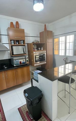 Casa à venda com 148m², 2 quartos e 2 vagas Casa à venda com 148m², 2 quartos e 2 vagasCozinha