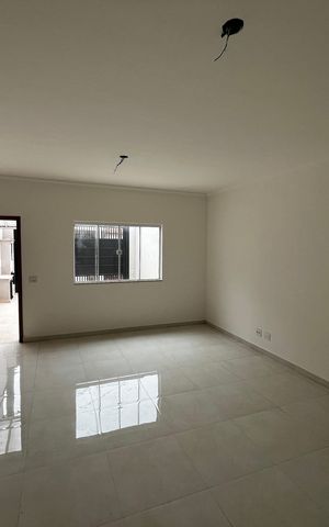 Casa à venda com 100m², 3 quartos e 2 vagasSala