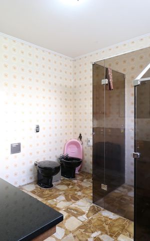Casa à venda com 1500m², 4 quartos e 5 vagasBanheiro da Suíte 1