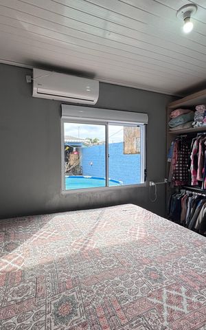 Casa à venda com 44m², 2 quartos e 2 vagas Casa à venda com 44m², 2 quartos e 2 vagasQuarto 1