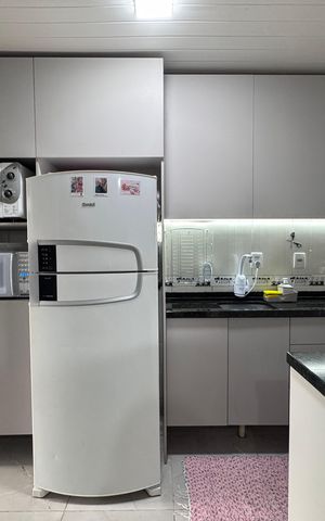 Casa à venda com 44m², 2 quartos e 2 vagas Casa à venda com 44m², 2 quartos e 2 vagasCozinha