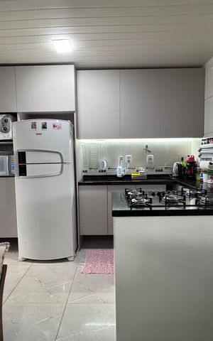 Casa à venda com 44m², 2 quartos e 2 vagas Casa à venda com 44m², 2 quartos e 2 vagasCozinha