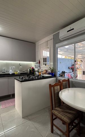 Casa à venda com 44m², 2 quartos e 2 vagas Casa à venda com 44m², 2 quartos e 2 vagasCozinha