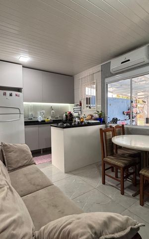 Casa à venda com 44m², 2 quartos e 2 vagas Casa à venda com 44m², 2 quartos e 2 vagasSala