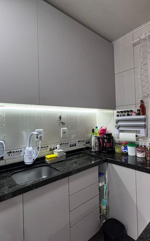 Casa à venda com 44m², 2 quartos e 2 vagas Casa à venda com 44m², 2 quartos e 2 vagasCozinha