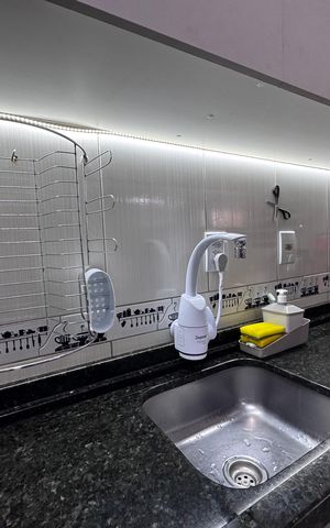 Casa à venda com 44m², 2 quartos e 2 vagas Casa à venda com 44m², 2 quartos e 2 vagasCozinha