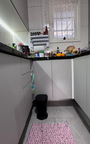 Casa à venda com 44m², 2 quartos e 2 vagas Casa à venda com 44m², 2 quartos e 2 vagasCozinha