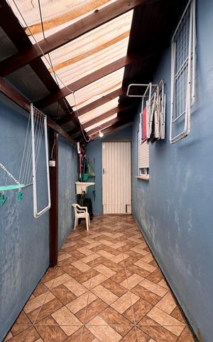 Casa à venda com 44m², 2 quartos e 2 vagas Casa à venda com 44m², 2 quartos e 2 vagasCorredor