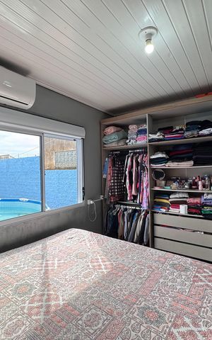 Casa à venda com 44m², 2 quartos e 2 vagas Casa à venda com 44m², 2 quartos e 2 vagasQuarto 1