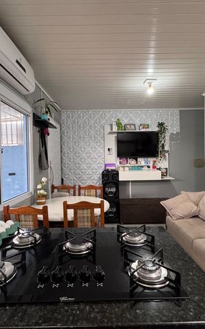 Casa à venda com 44m², 2 quartos e 2 vagas Casa à venda com 44m², 2 quartos e 2 vagasSala