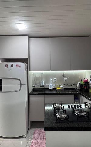 Casa à venda com 44m², 2 quartos e 2 vagas Casa à venda com 44m², 2 quartos e 2 vagasCozinha