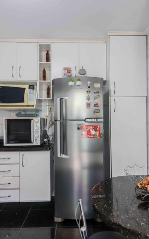 Casa à venda com 140m², 3 quartos e 2 vagas Casa à venda com 140m², 3 quartos e 2 vagasCozinha