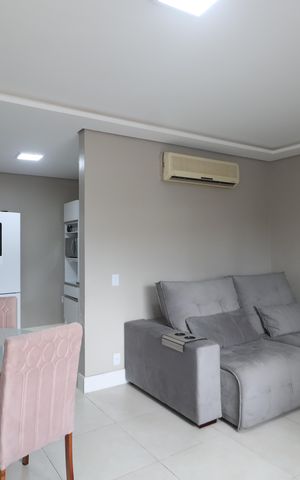 Casa à venda com 67m², 2 quartos e 2 vagasSala