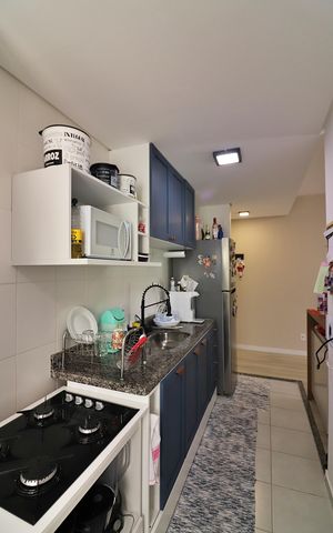 Apartamento à venda com 56m², 2 quartos e 1 vagaCozinha e Área de Serviço