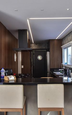 Casa de condomínio à venda com 300m², 4 quartos e 3 vagasCozinha