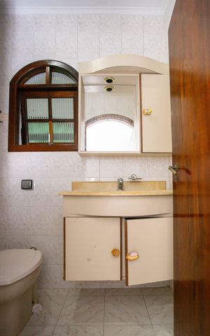 Casa à venda com 320m², 3 quartos e 2 vagasBanheiro da Suíte 2
