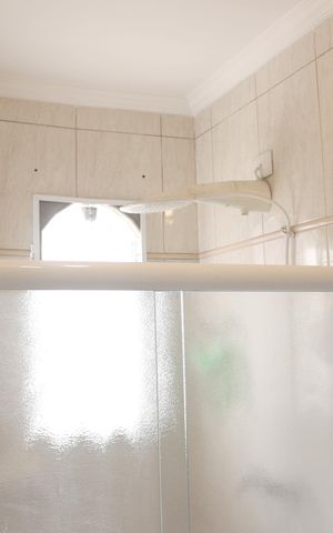 Casa à venda com 296m², 3 quartos e 6 vagasBanheiro da Suíte 1