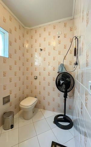 Casa à venda com 354m², 4 quartos e 4 vagasBanheiro da Suíte