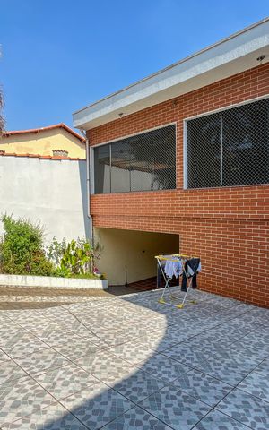 Casa à venda com 354m², 4 quartos e 4 vagasGaragem