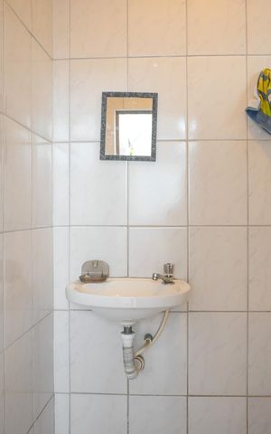 Casa à venda com 249m², 3 quartos e 3 vagas Casa à venda com 249m², 3 quartos e 3 vagasBanheiro de Serviço