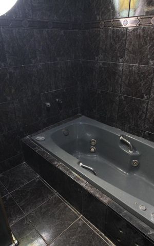 Casa à venda com 450m², 4 quartos e 6 vagasBanhero da Suíte
