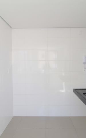 Apartamento à venda com 63m², 2 quartos e 1 vagaCozinha e Área de Serviço