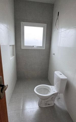 Casa à venda com 62m², 2 quartos e 2 vagas Casa à venda com 62m², 2 quartos e 2 vagasBanheiro da Suíte