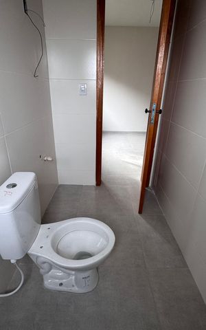 Casa à venda com 62m², 2 quartos e 2 vagas Casa à venda com 62m², 2 quartos e 2 vagasBanheiro da Suíte