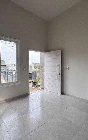Casa à venda com 62m², 2 quartos e 2 vagas Casa à venda com 62m², 2 quartos e 2 vagasSala