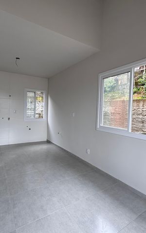 Casa à venda com 62m², 2 quartos e 2 vagas Casa à venda com 62m², 2 quartos e 2 vagasSala