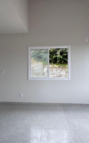 Casa à venda com 62m², 2 quartos e 2 vagas Casa à venda com 62m², 2 quartos e 2 vagasSala