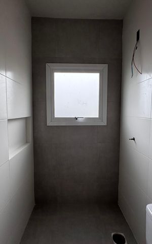 Casa à venda com 62m², 2 quartos e 2 vagas Casa à venda com 62m², 2 quartos e 2 vagasBanheiro da Suíte