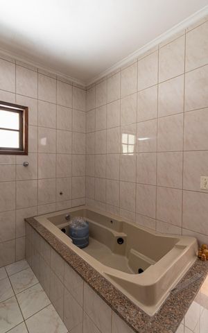 Casa à venda com 105m², 3 quartos e 2 vagas Casa à venda com 105m², 3 quartos e 2 vagasBanheiro Suíte 3