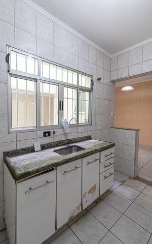 Casa à venda com 105m², 3 quartos e 2 vagas Casa à venda com 105m², 3 quartos e 2 vagasCozinha