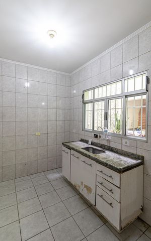 Casa à venda com 105m², 3 quartos e 2 vagas Casa à venda com 105m², 3 quartos e 2 vagasCozinha