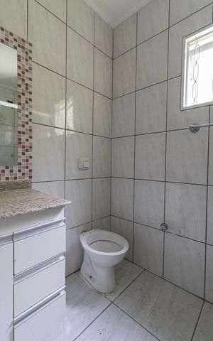 Casa à venda com 105m², 3 quartos e 2 vagas Casa à venda com 105m², 3 quartos e 2 vagasBanheiro Suíte 2
