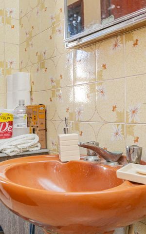 Casa à venda com 314m², 4 quartos e 3 vagasBanheiro 2