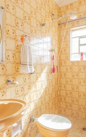 Casa à venda com 314m², 4 quartos e 3 vagasBanheiro 3