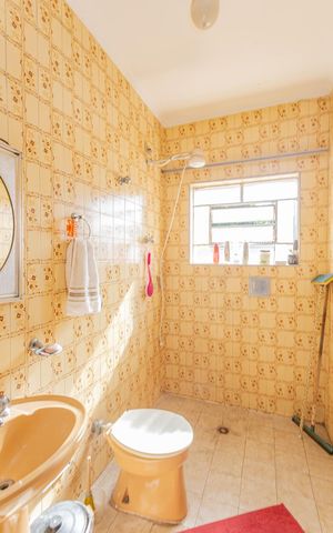 Casa à venda com 314m², 4 quartos e 3 vagasBanheiro 3
