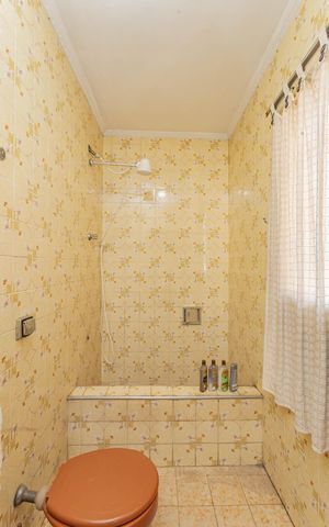 Casa à venda com 314m², 4 quartos e 3 vagasBanheiro 2