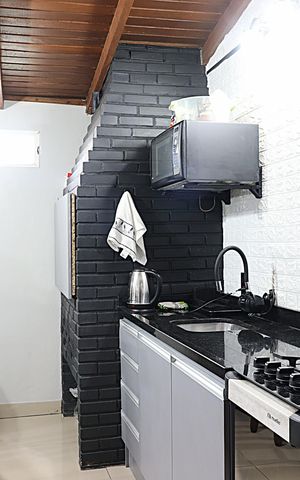 Casa à venda com 110m², 3 quartos e 2 vagasCozinha - Churrasqueira