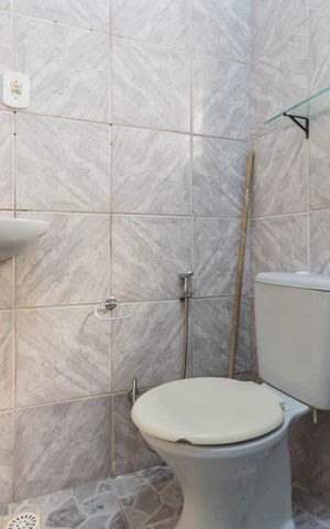 Casa à venda com 56m², 4 quartos e sem vagaBanheiro 1