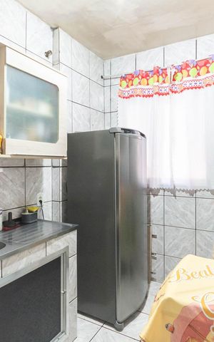 Casa à venda com 56m², 4 quartos e sem vagaCozinha (segundo andar)